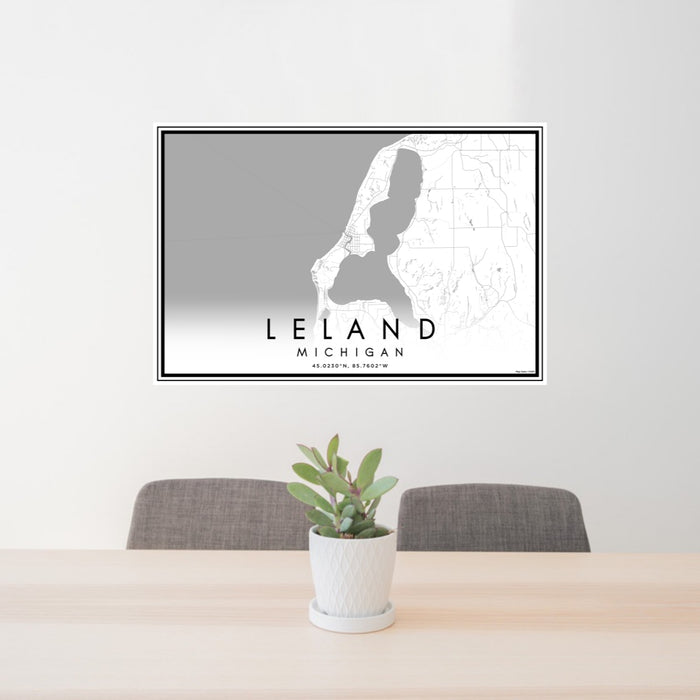 24x36 Leland Michigan Map Print Lanscape Orientation in Classic Style Behind 2 Chairs Table and Potted Plant