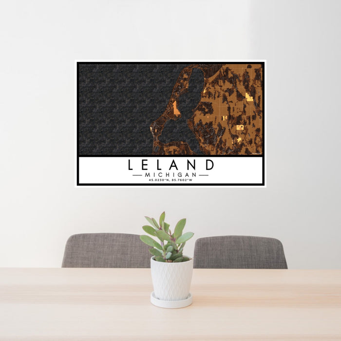 24x36 Leland Michigan Map Print Lanscape Orientation in Ember Style Behind 2 Chairs Table and Potted Plant