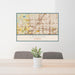 24x36 Lenexa Kansas Map Print Lanscape Orientation in Woodblock Style Behind 2 Chairs Table and Potted Plant