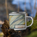 Right View Custom Lewistown Pennsylvania Map Enamel Mug in Woodblock on Grass With Trees in Background