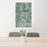 24x36 Light Farms Celina Map Print Portrait Orientation in Afternoon Style Behind 2 Chairs Table and Potted Plant
