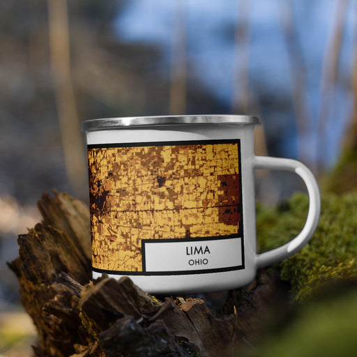 Right View Custom Lima Ohio Map Enamel Mug in Ember on Grass With Trees in Background