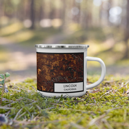 Right View Custom Lincoln California Map Enamel Mug in Ember on Grass With Trees in Background