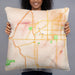 Person holding 22x22 Custom Lincoln Nebraska Map Throw Pillow in Watercolor