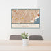 24x36 Lincoln Park Michigan Map Print Lanscape Orientation in Woodblock Style Behind 2 Chairs Table and Potted Plant