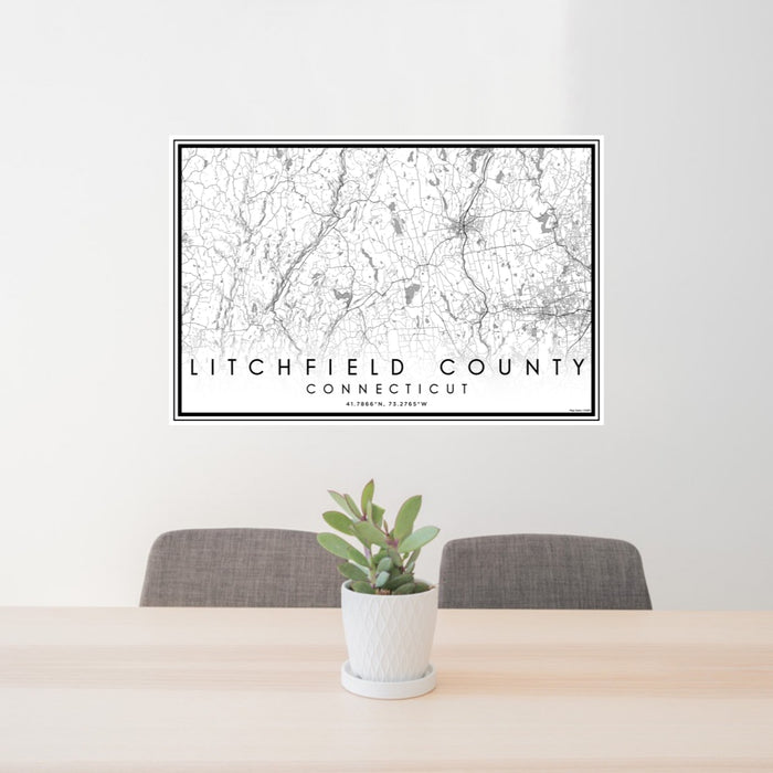 24x36 Litchfield County Connecticut Map Print Lanscape Orientation in Classic Style Behind 2 Chairs Table and Potted Plant