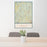 24x36 Litchfield County Connecticut Map Print Portrait Orientation in Woodblock Style Behind 2 Chairs Table and Potted Plant