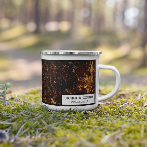 Right View Custom Litchfield County Connecticut Map Enamel Mug in Ember on Grass With Trees in Background