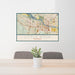 24x36 Little Rock Arkansas Map Print Landscape Orientation in Woodblock Style Behind 2 Chairs Table and Potted Plant