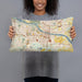 Person holding 20x12 Custom Little Rock Arkansas Map Throw Pillow in Woodblock