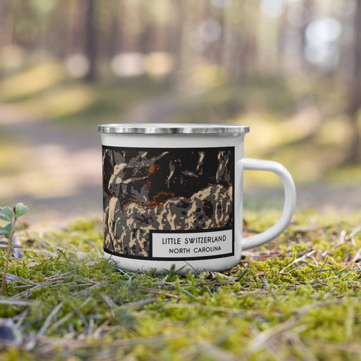 Right View Custom Little Switzerland North Carolina Map Enamel Mug in Ember on Grass With Trees in Background