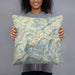 Person holding 18x18 Custom Little Switzerland North Carolina Map Throw Pillow in Woodblock