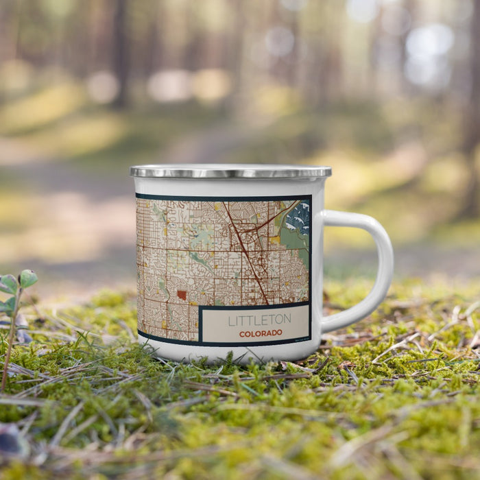 Right View Custom Littleton Colorado Map Enamel Mug in Woodblock on Grass With Trees in Background