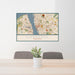 24x36 Liverpool England Map Print Lanscape Orientation in Woodblock Style Behind 2 Chairs Table and Potted Plant