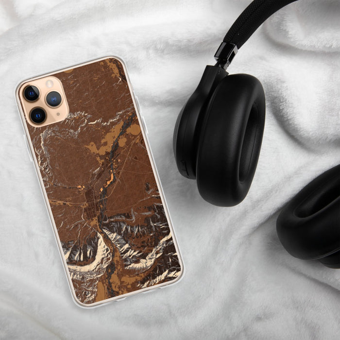 Custom Livingston Montana Map Phone Case in Ember on Table with Black Headphones