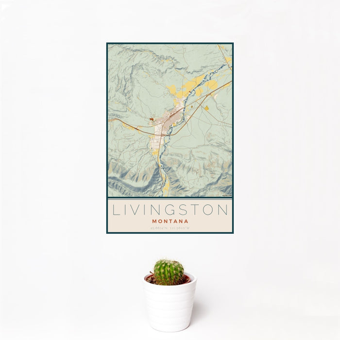 12x18 Livingston Montana Map Print Portrait Orientation in Woodblock Style With Small Cactus Plant in White Planter