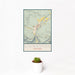 12x18 Livingston Montana Map Print Portrait Orientation in Woodblock Style With Small Cactus Plant in White Planter
