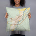 Person holding 18x18 Custom Livingston Montana Map Throw Pillow in Woodblock