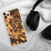 Custom Locust Grove Georgia Map Phone Case in Ember on Table with Black Headphones