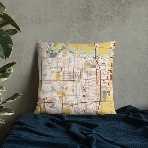 Custom Lodi California Map Throw Pillow in Woodblock on Bedding Against Wall