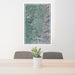 24x36 Logan Utah Map Print Portrait Orientation in Afternoon Style Behind 2 Chairs Table and Potted Plant