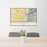 24x36 Logan Utah Map Print Landscape Orientation in Woodblock Style Behind 2 Chairs Table and Potted Plant
