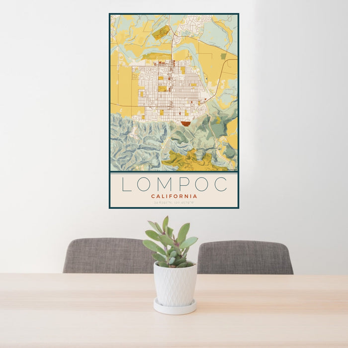 24x36 Lompoc California Map Print Portrait Orientation in Woodblock Style Behind 2 Chairs Table and Potted Plant