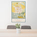 24x36 Lompoc California Map Print Portrait Orientation in Woodblock Style Behind 2 Chairs Table and Potted Plant