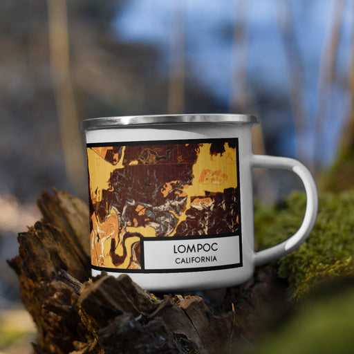 Right View Custom Lompoc California Map Enamel Mug in Ember on Grass With Trees in Background