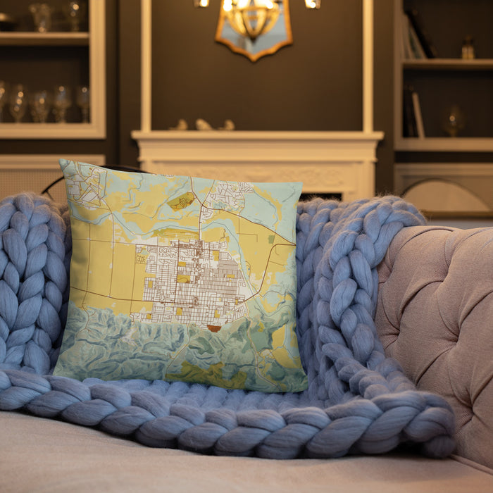 Custom Lompoc California Map Throw Pillow in Woodblock on Cream Colored Couch