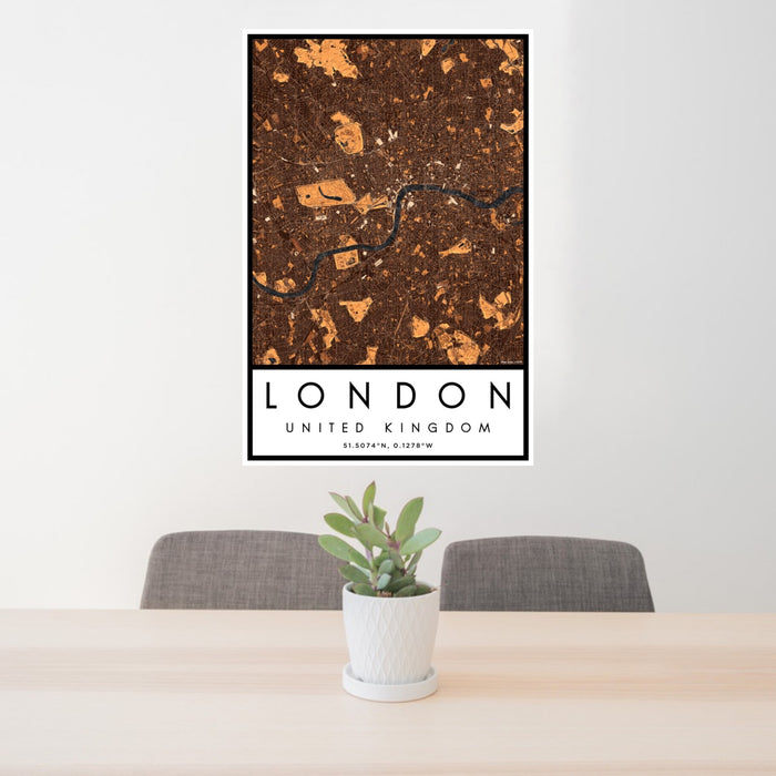 24x36 London United Kingdom Map Print Portrait Orientation in Ember Style Behind 2 Chairs Table and Potted Plant