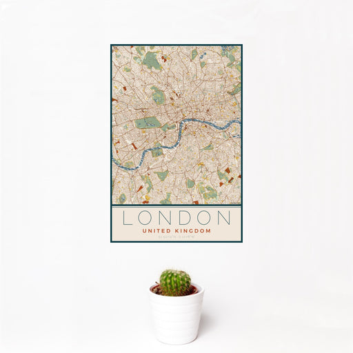 12x18 London United Kingdom Map Print Portrait Orientation in Woodblock Style With Small Cactus Plant in White Planter