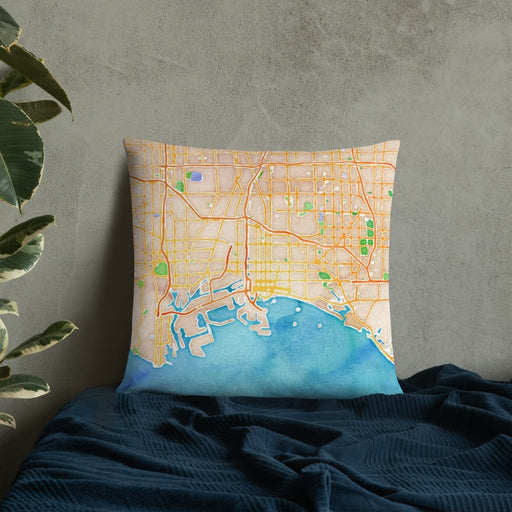 Custom Long Beach California Map Throw Pillow in Watercolor on Bedding Against Wall