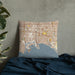 Custom Long Beach California Map Throw Pillow in Woodblock on Bedding Against Wall