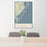 24x36 Long Beach Island New Jersey Map Print Portrait Orientation in Woodblock Style Behind 2 Chairs Table and Potted Plant