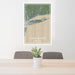 24x36 Long Island New York Map Print Portrait Orientation in Afternoon Style Behind 2 Chairs Table and Potted Plant