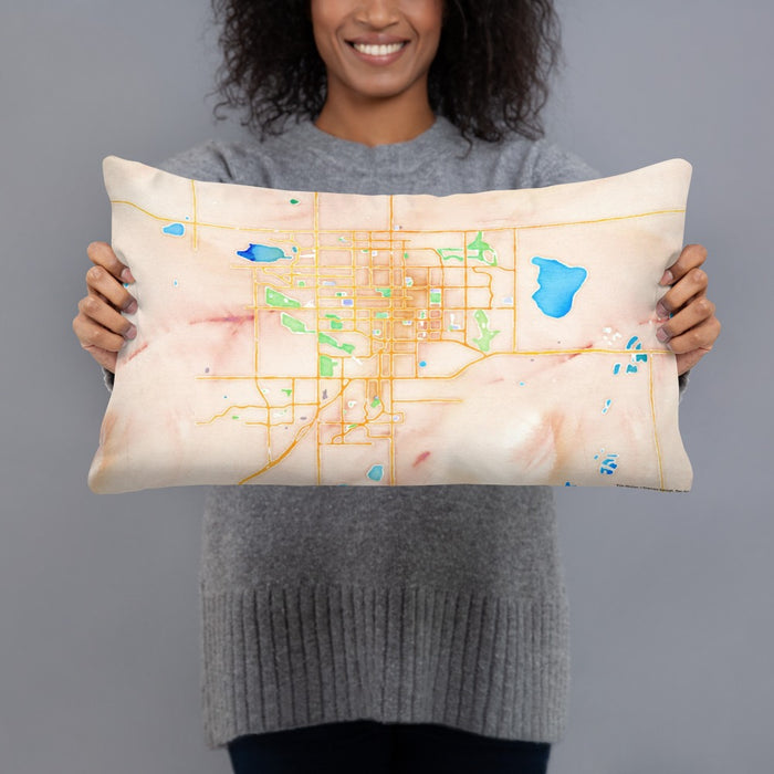Person holding 20x12 Custom Longmont Colorado Map Throw Pillow in Watercolor