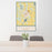 24x36 Long Prairie Minnesota Map Print Portrait Orientation in Woodblock Style Behind 2 Chairs Table and Potted Plant