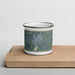 Front View Custom Long Prairie Minnesota Map Enamel Mug in Afternoon on Cutting Board