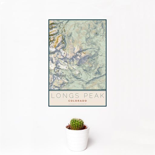 12x18 Longs Peak Colorado Map Print Portrait Orientation in Woodblock Style With Small Cactus Plant in White Planter