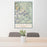 24x36 Longs Peak Colorado Map Print Portrait Orientation in Woodblock Style Behind 2 Chairs Table and Potted Plant