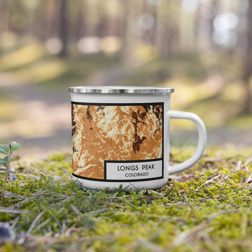 Right View Custom Longs Peak Colorado Map Enamel Mug in Ember on Grass With Trees in Background