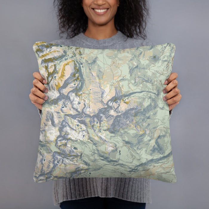 Person holding 18x18 Custom Longs Peak Colorado Map Throw Pillow in Woodblock