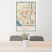24x36 Longview Washington Map Print Portrait Orientation in Woodblock Style Behind 2 Chairs Table and Potted Plant