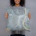 Person holding 18x18 Custom Longview Washington Map Throw Pillow in Afternoon