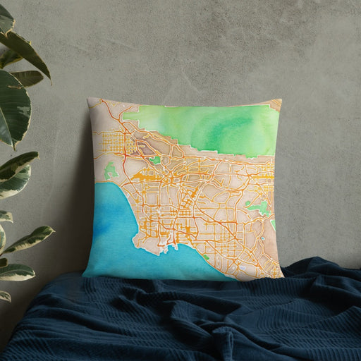 Custom Los Angeles California Map Throw Pillow in Watercolor on Bedding Against Wall