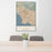 24x36 Los Angeles California Map Print Portrait Orientation in Woodblock Style Behind 2 Chairs Table and Potted Plant