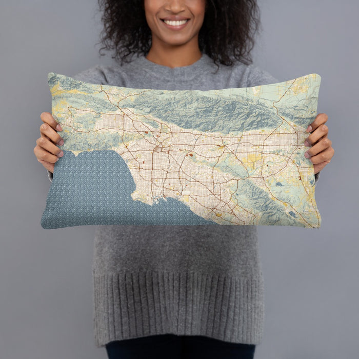 Person holding 20x12 Custom Los Angeles California Map Throw Pillow in Woodblock