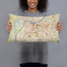 Person holding 20x12 Custom Louisville Kentucky Map Throw Pillow in Woodblock