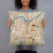Person holding 18x18 Custom Louisville Kentucky Map Throw Pillow in Woodblock